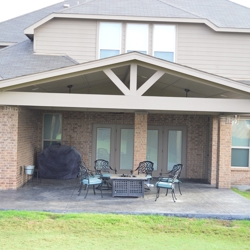  Covered Patio In Forney, TX with Gable Roof And Gable End Detailing.