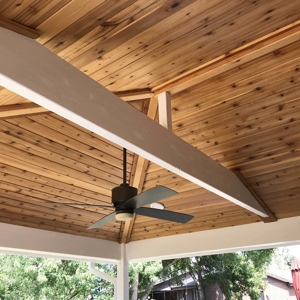 Cedar Ceiling Over Patio with Large White Beam