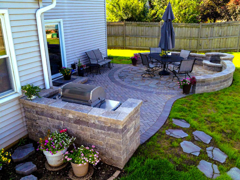 paver patio with firepit and grill surround in marvin nc