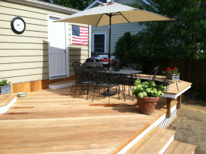 after new deck with bench railing