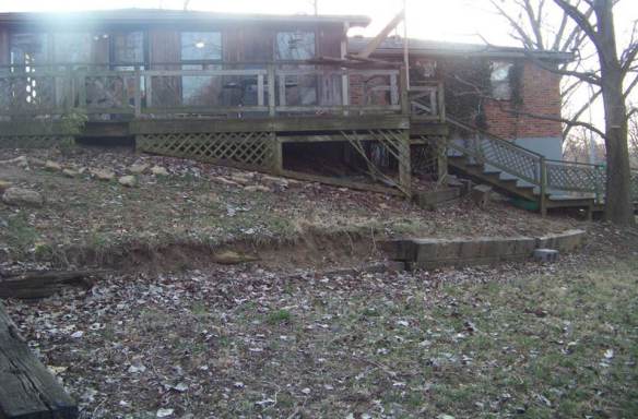 dilapidated deck and yardspace