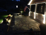 front of home at night with new lighting