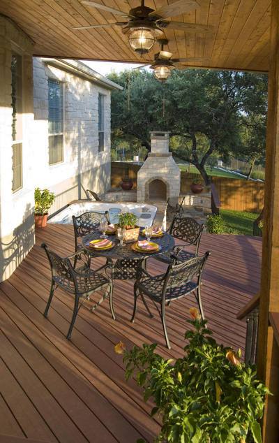 patio with outdoor fireplace 