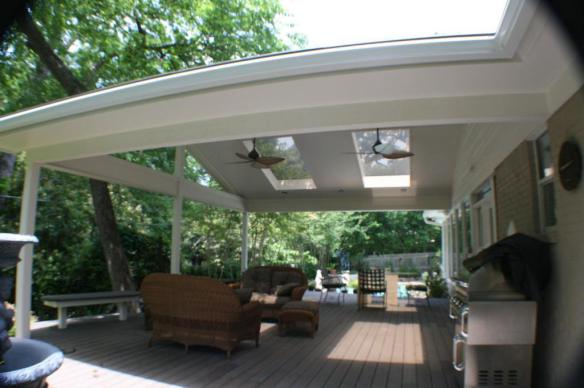 patio cover with built in skylights and ceiling fans