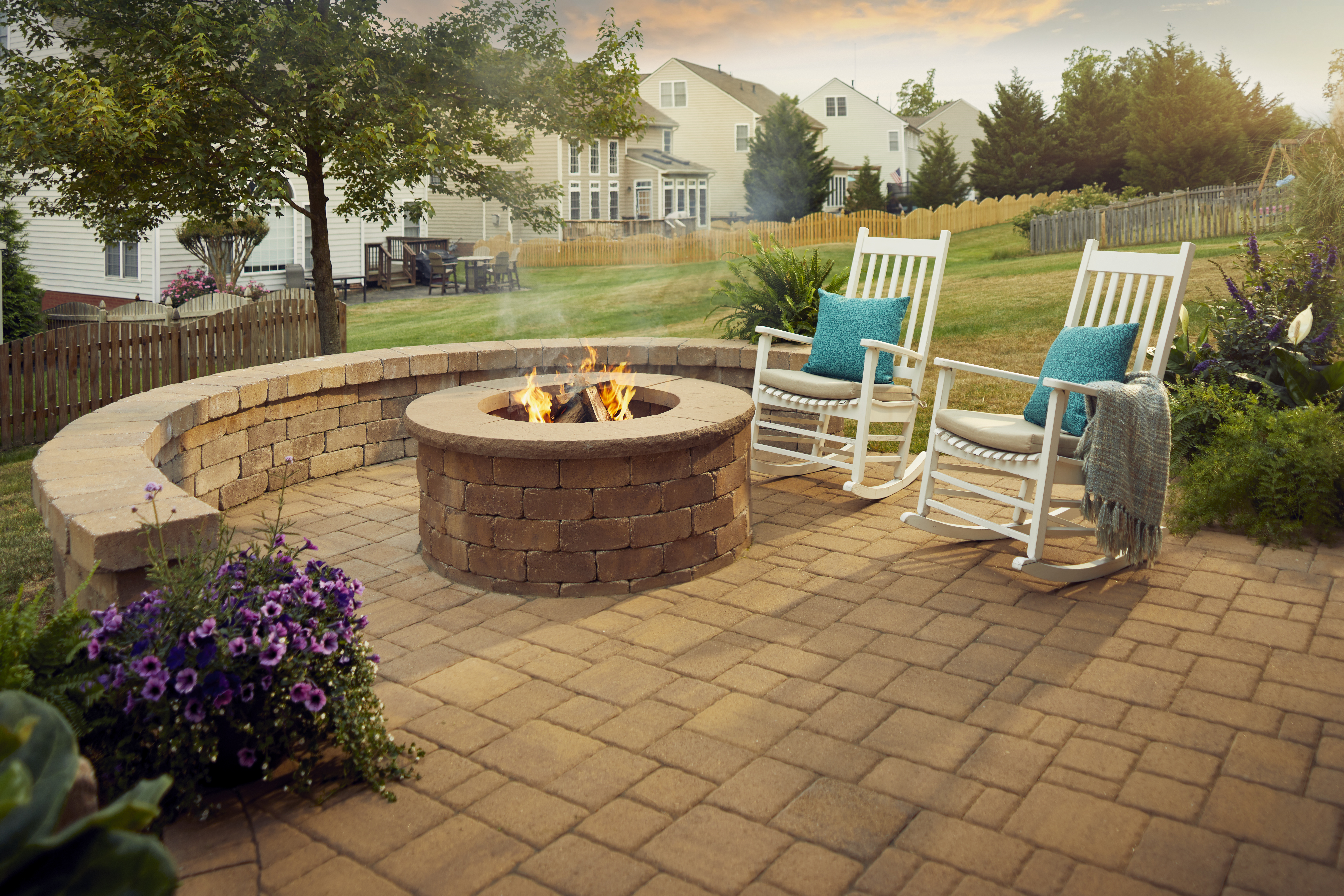 Custom outdoor patio design and installation with firepit