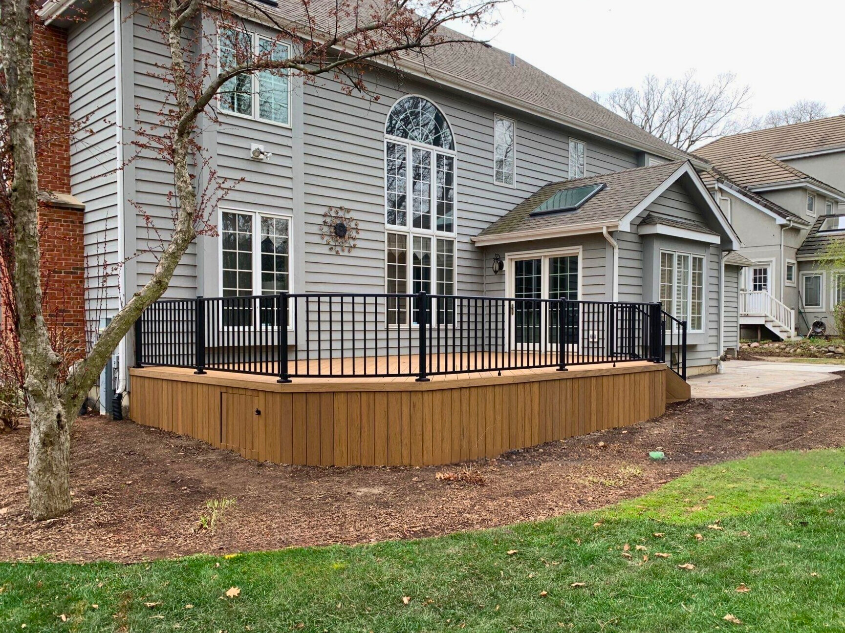 TimberTech deck and paver patio in Lisle, IL.