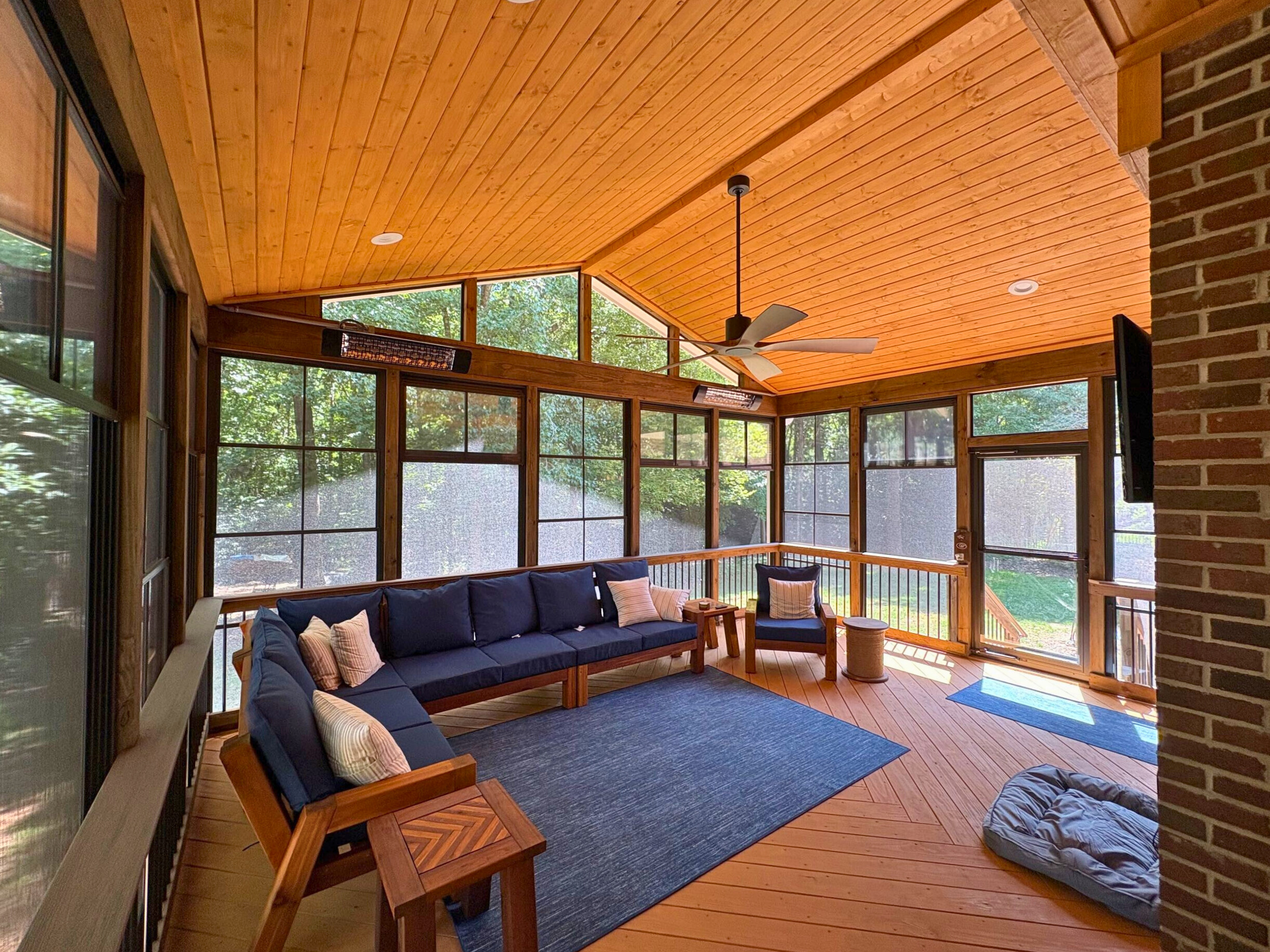 Custom screened porch with eze-breeze windows and an outdoor heater in Waxhaw, NC.
