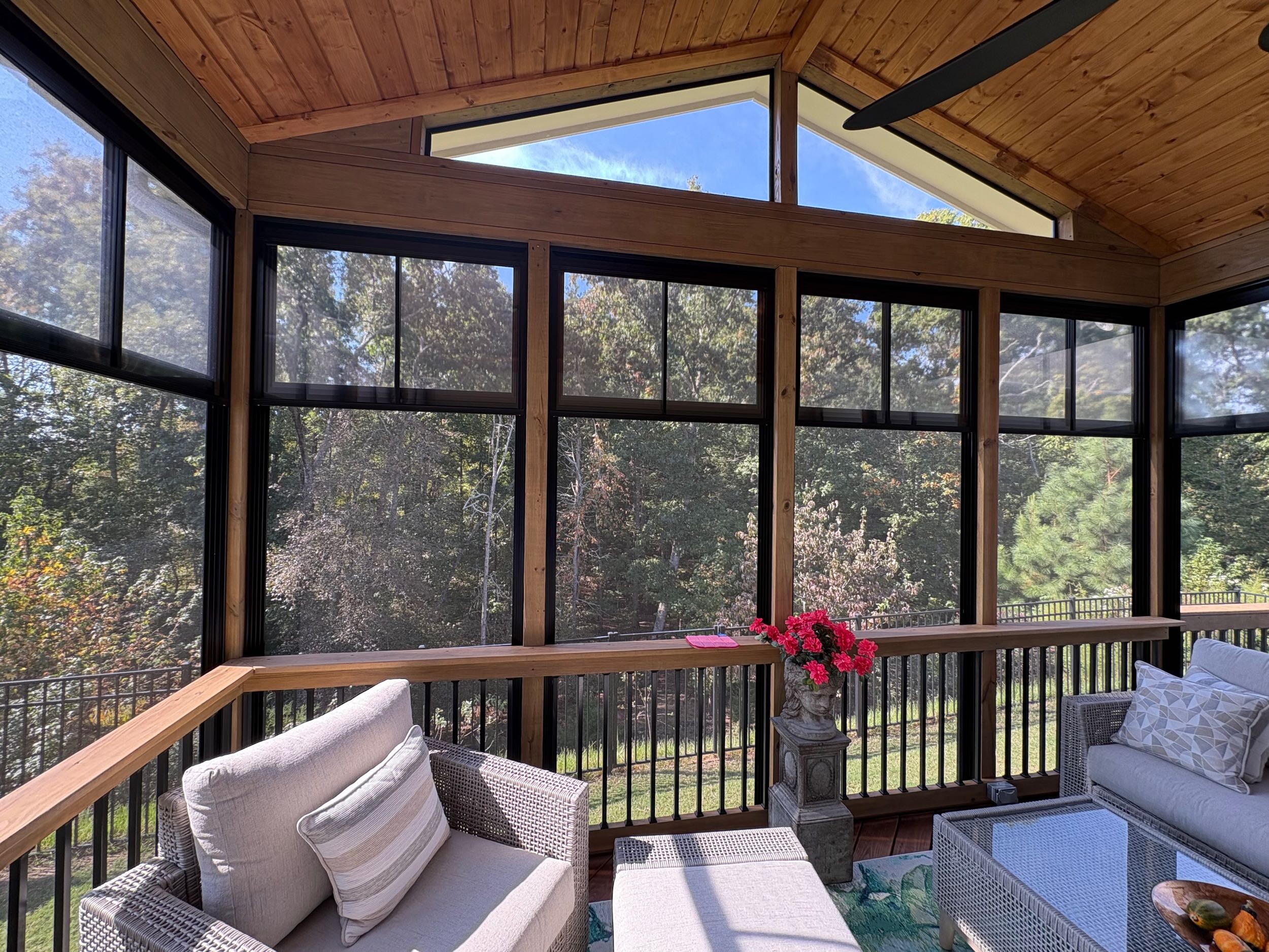 Eze-Breeze porch overlooking greenery and trees  in Lake Wylie, SC.