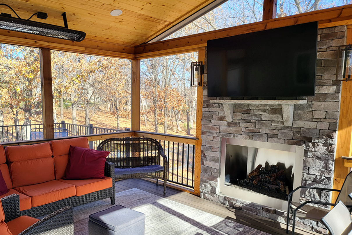 Outdoor fireplace plus radiant heat on Fairway KS screened porch