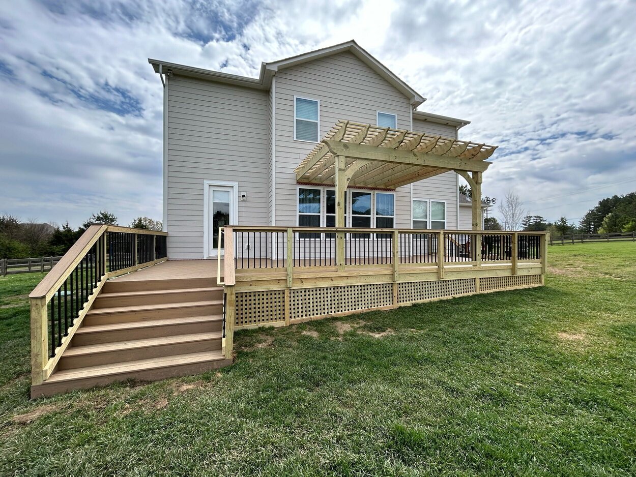 composite deck with wood lattice, rails, and pergola in marvin nc