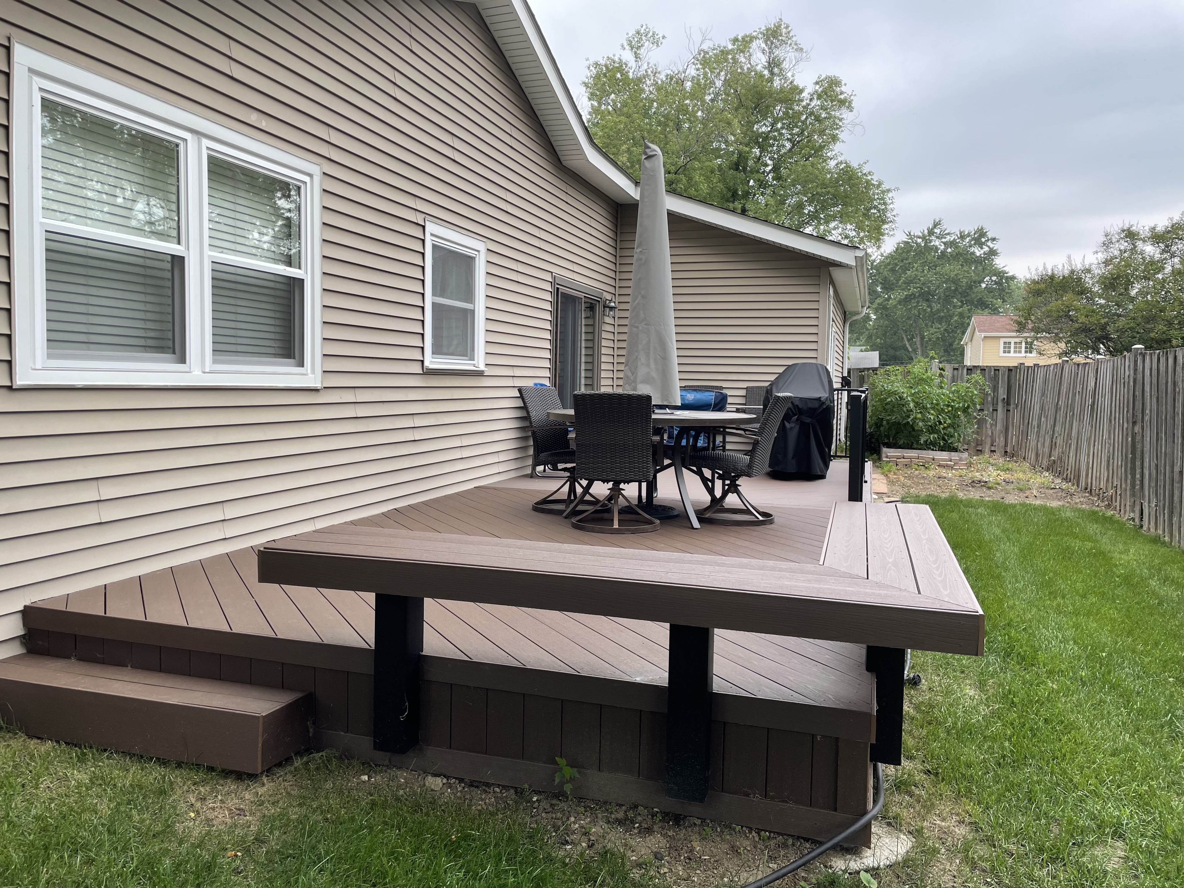 Brown composite deck in Schaumburg, IL by Archadeck of Chicagoland..