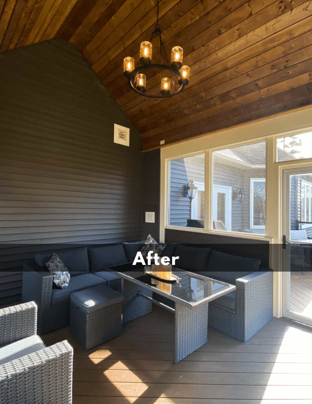 After photo of the screened room from inside, with couch and table