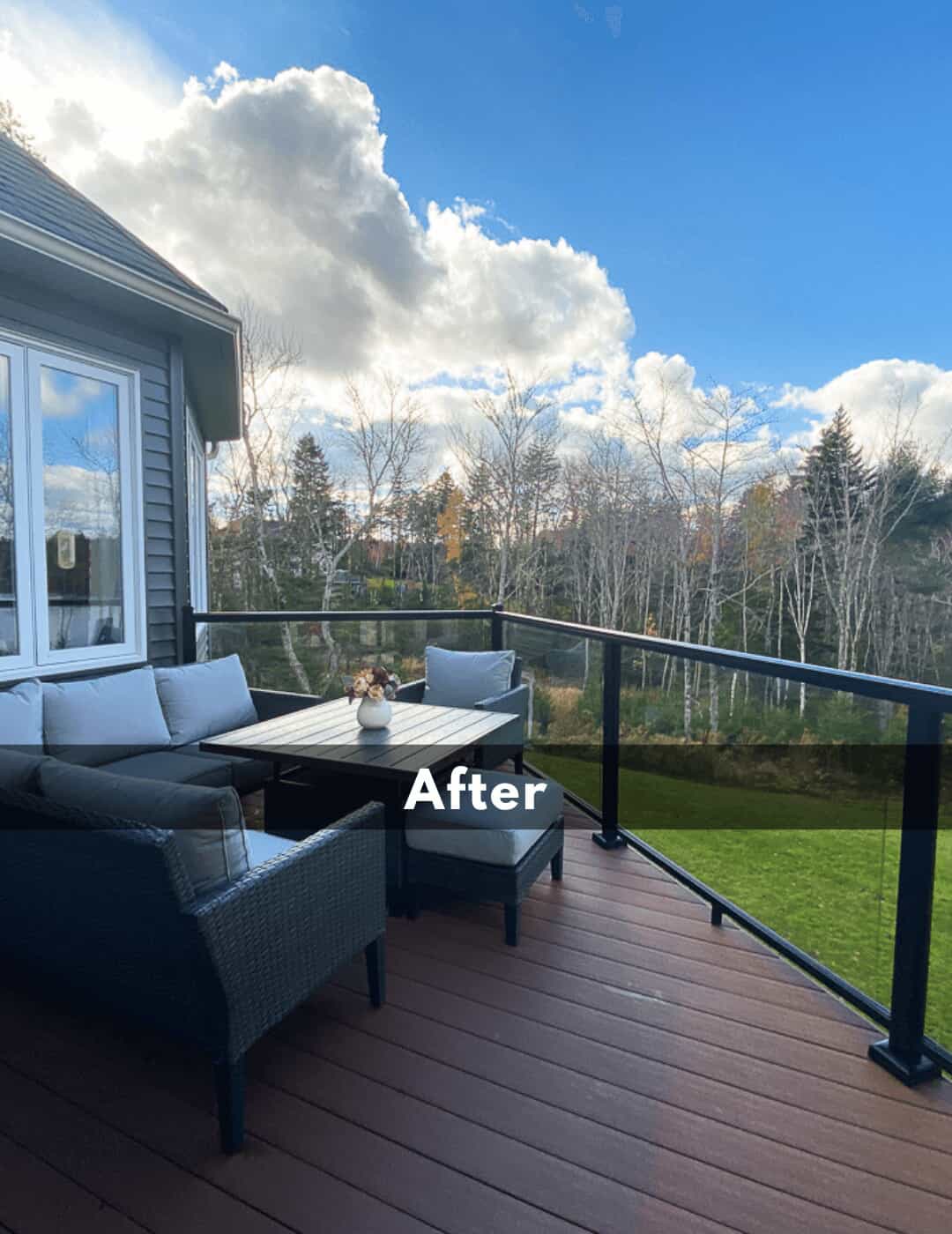 After photo of the adjacent deck looking out to the backyard and trees