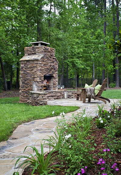 Flagstone Patio with stacked stone fireplace