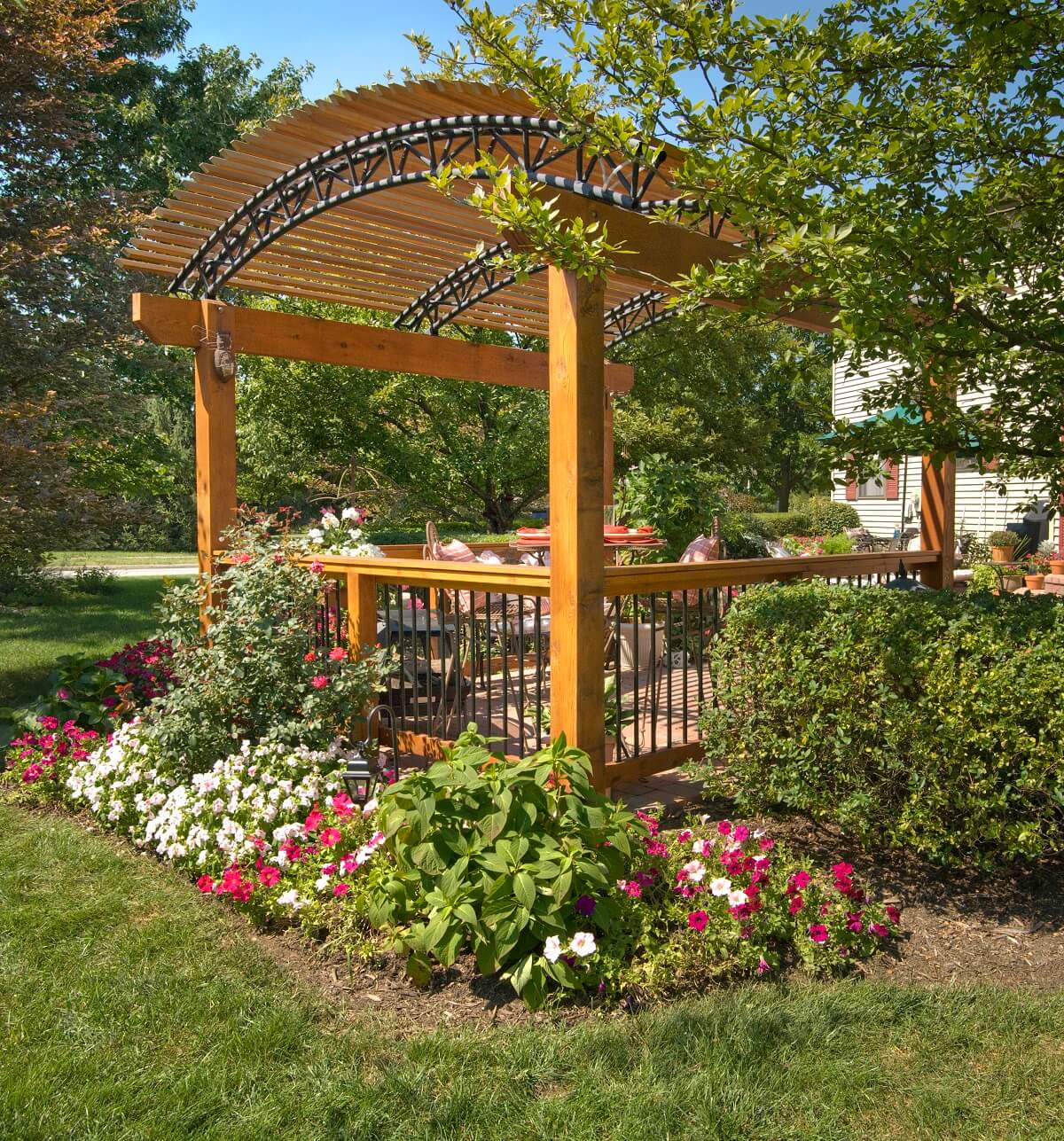 pergola with flowers and plants