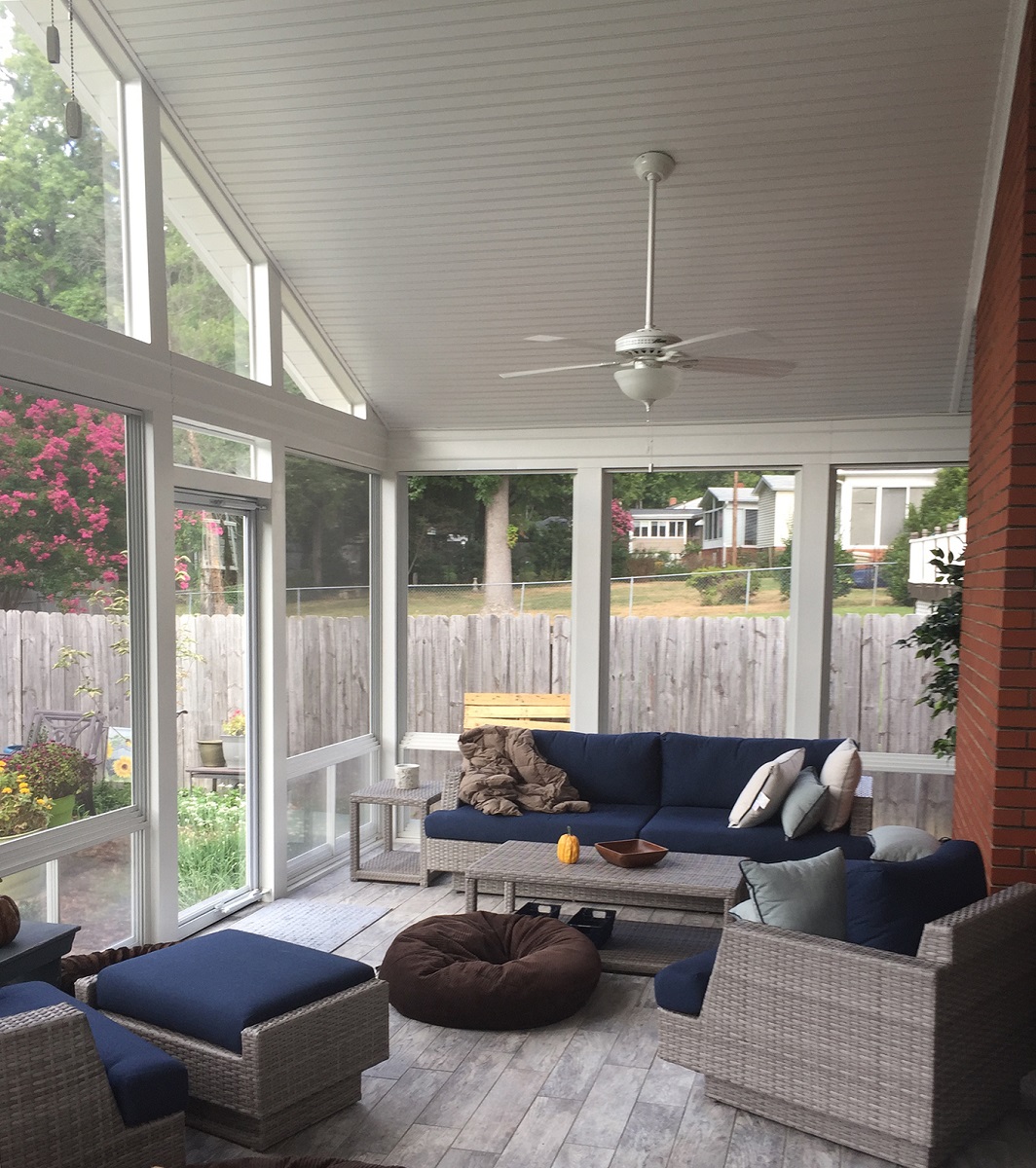 airy sunny porch with vaulted ceiling