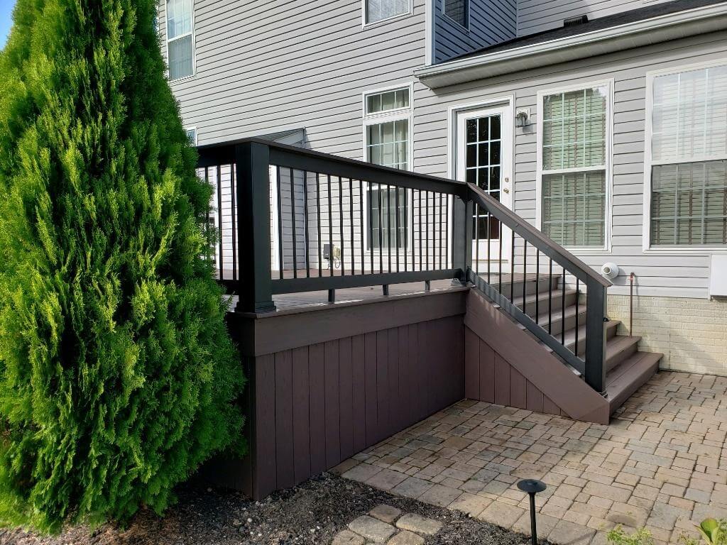 Low maintenance deck with railing