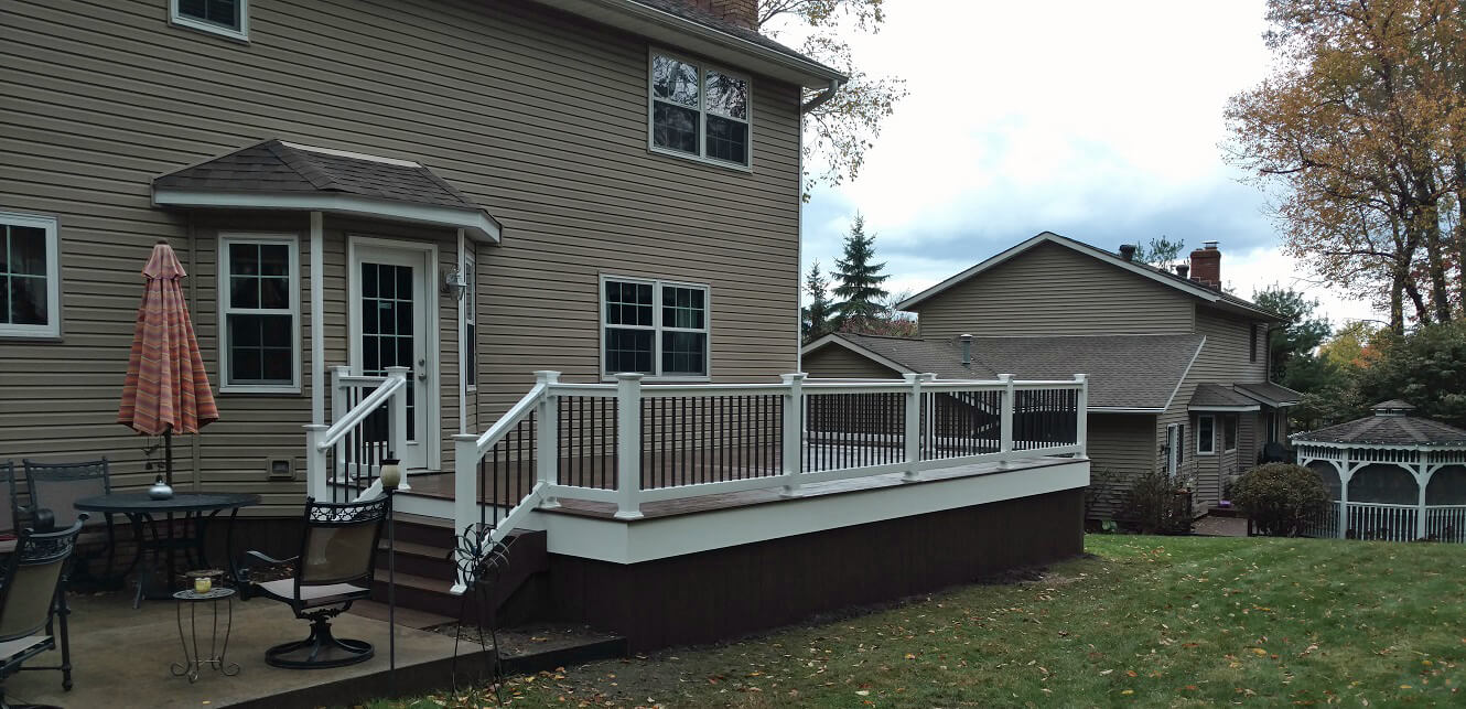 Wood deck with railing and stairs