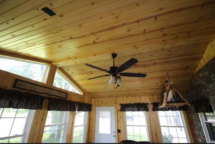 Three season room ceiling with fan and lighting