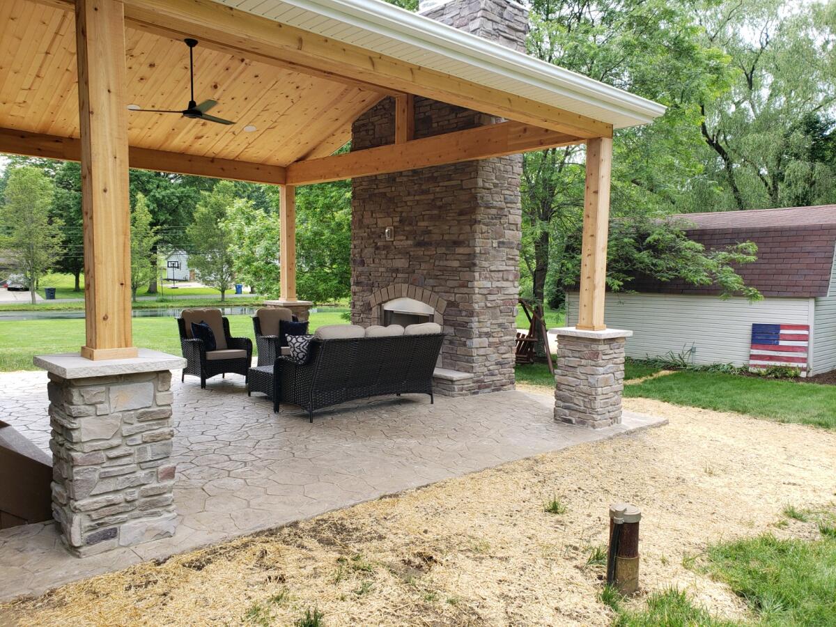 Delightful Covered Patio With Outdoor Fireplace in Akron OH.