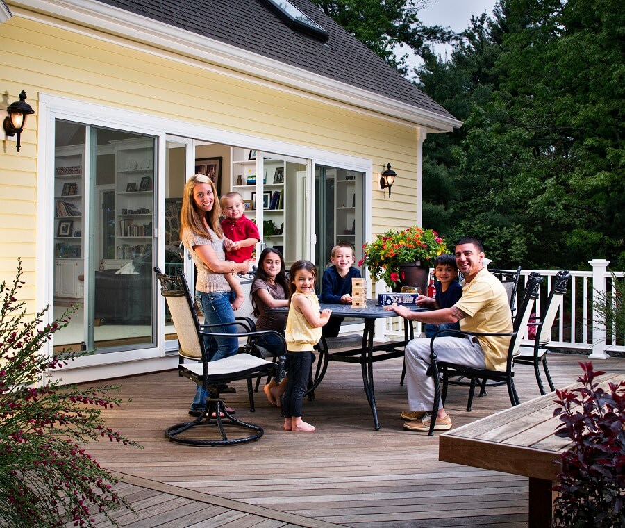 family playing on wooden deck