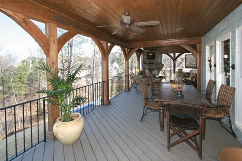 large wrap around porch with entertainment space 
