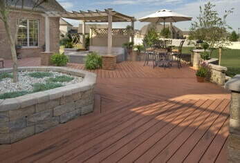 An example of a custom deck and entertainment area built by our professional outdoor deck builders