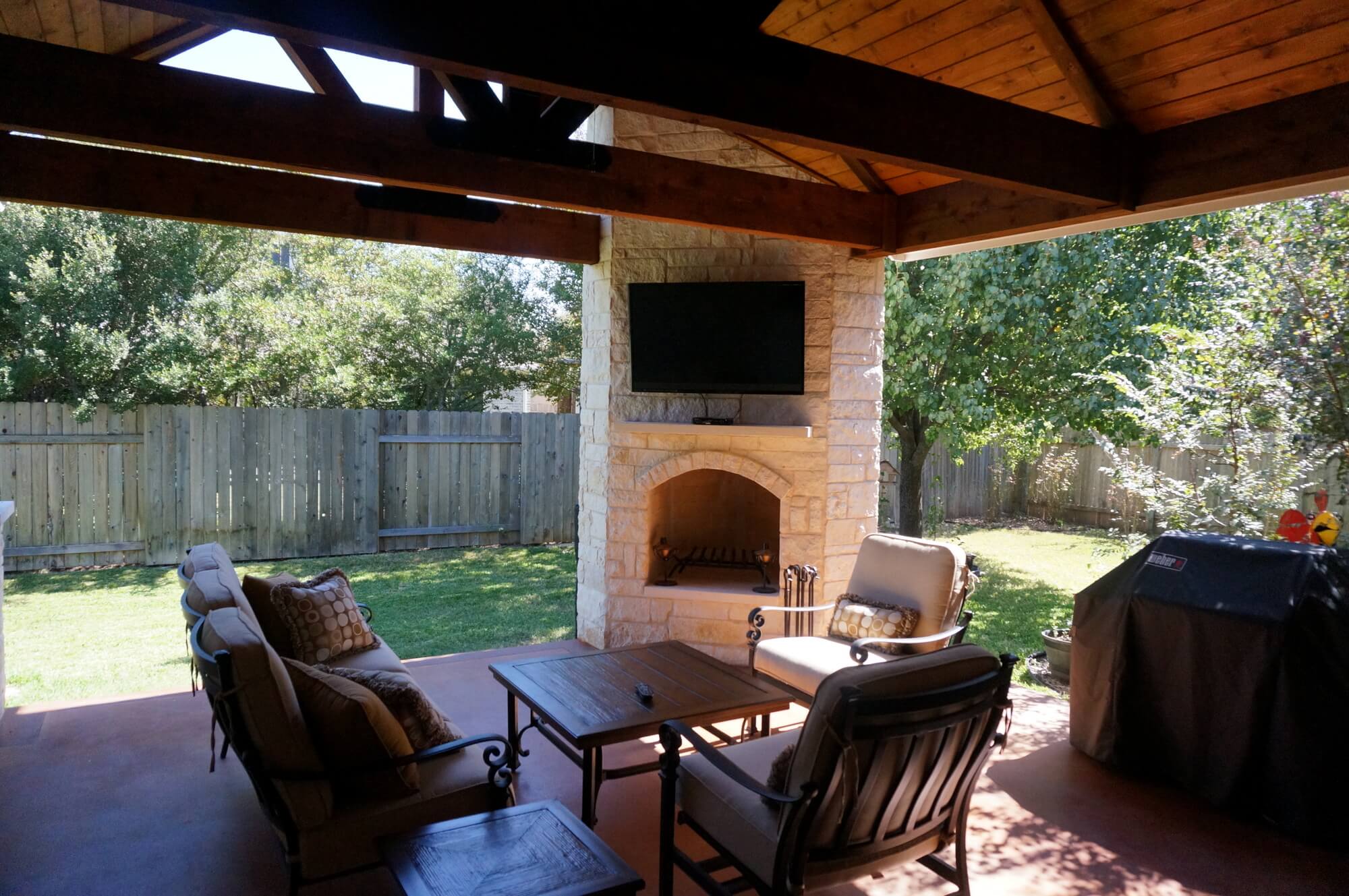 Covered patio with fireplace
