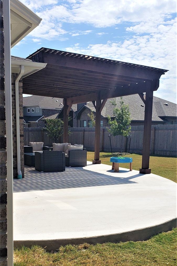 pflugerville side view of patio expansion and custom pergola
