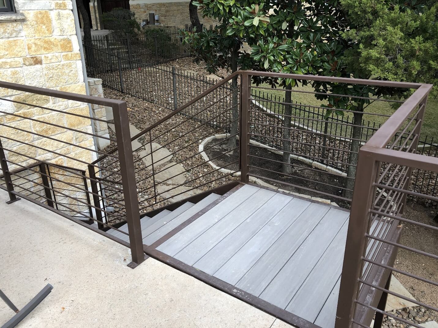Pool deck stairs with railing