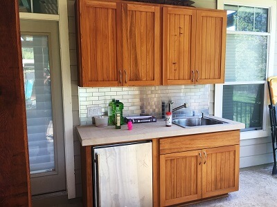 Custom outdoor kitchen cupboard and sink