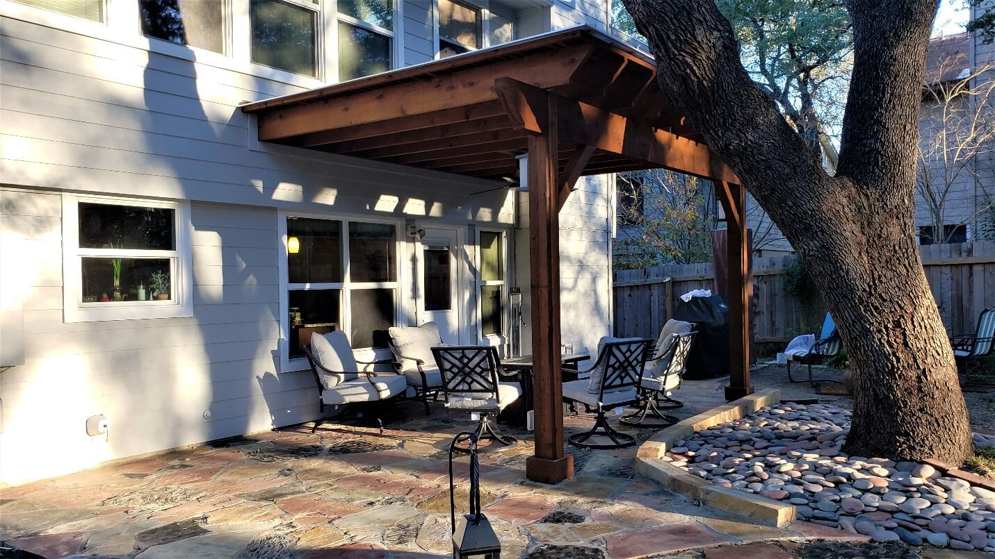 Covered patio with seating area