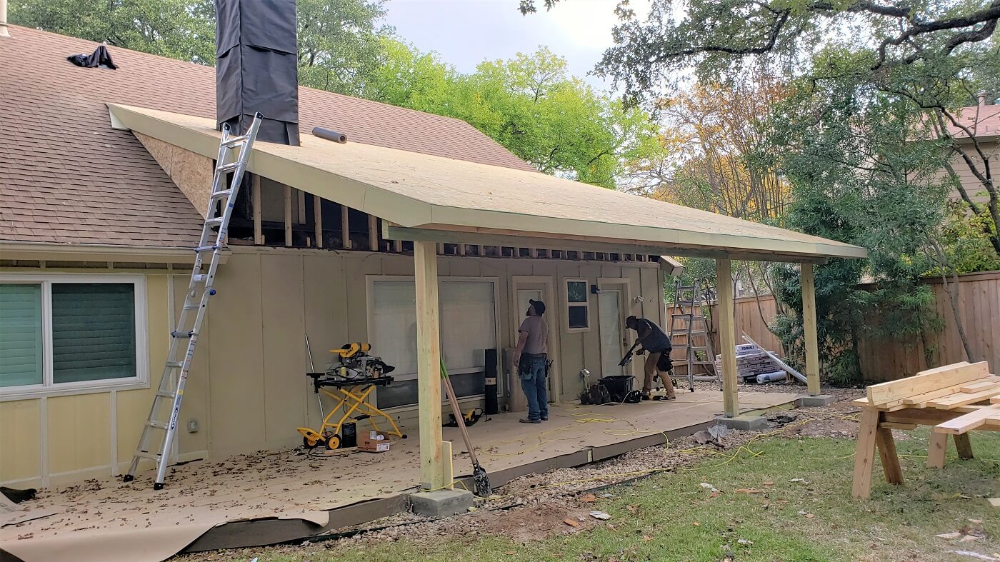 Men working on new porch and deck