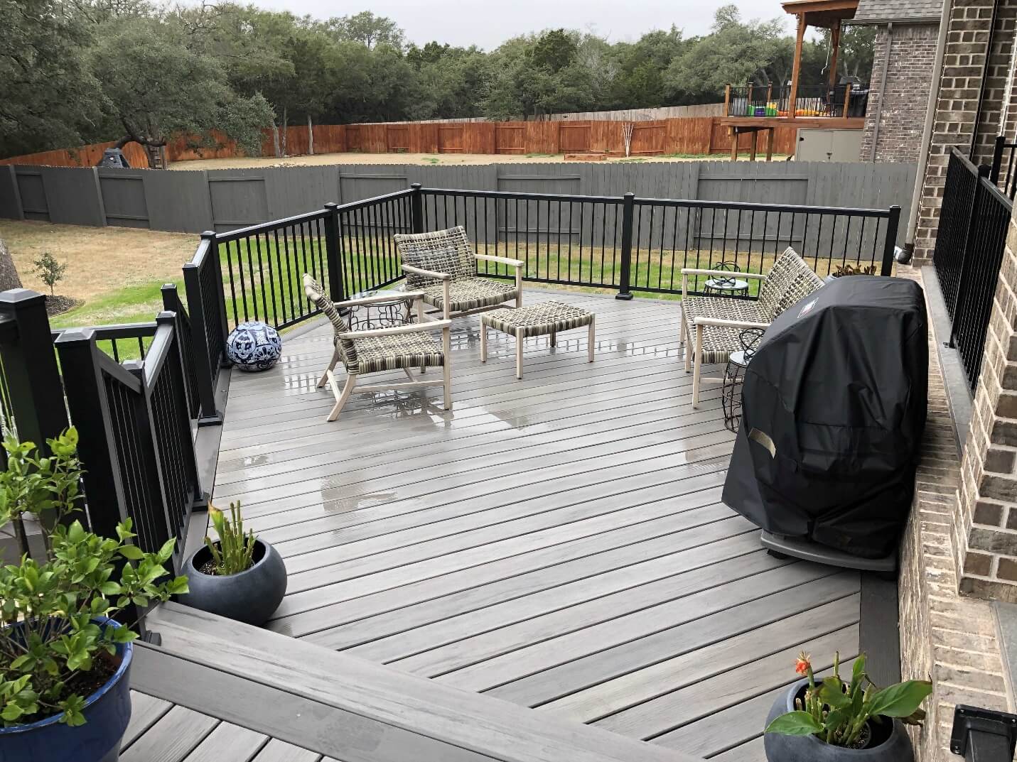 Custom backyard deck with seating area