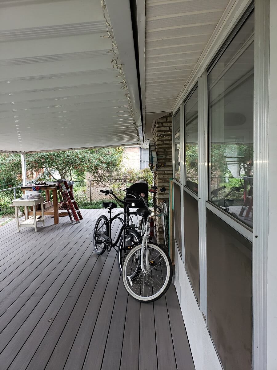 Wood deck with parked bicycle
