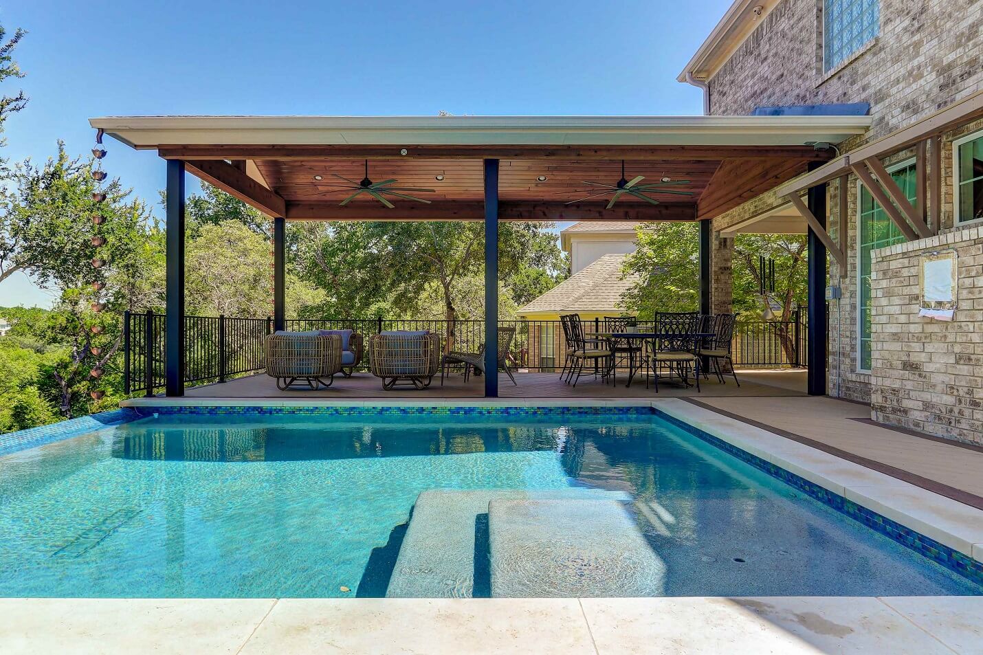 Covered pool deck and swimming pool