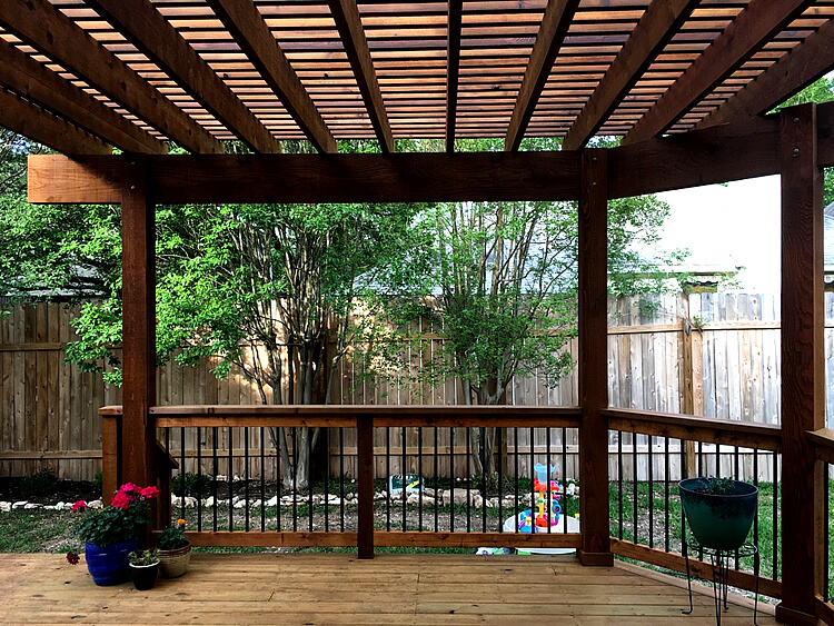 Backyard wood deck with pergola