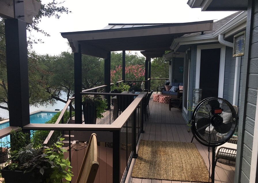 Wood deck with pool and river view