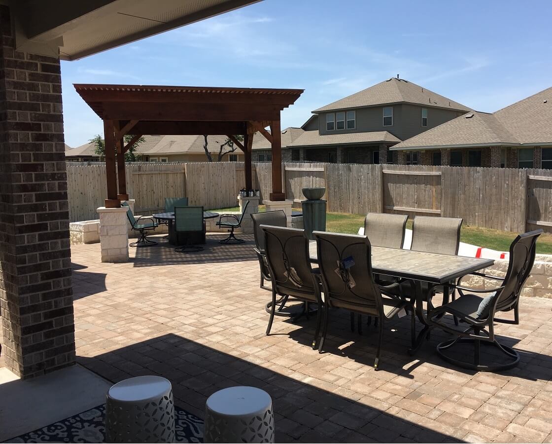 Patio with seating area and dining area