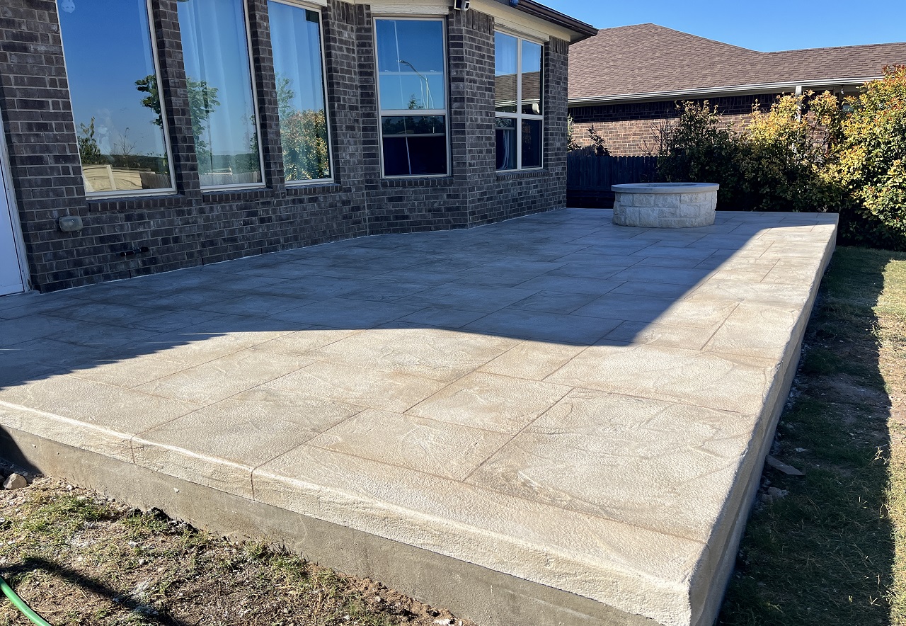 leander tx stain and stamp concrete overlay patio with fire pit