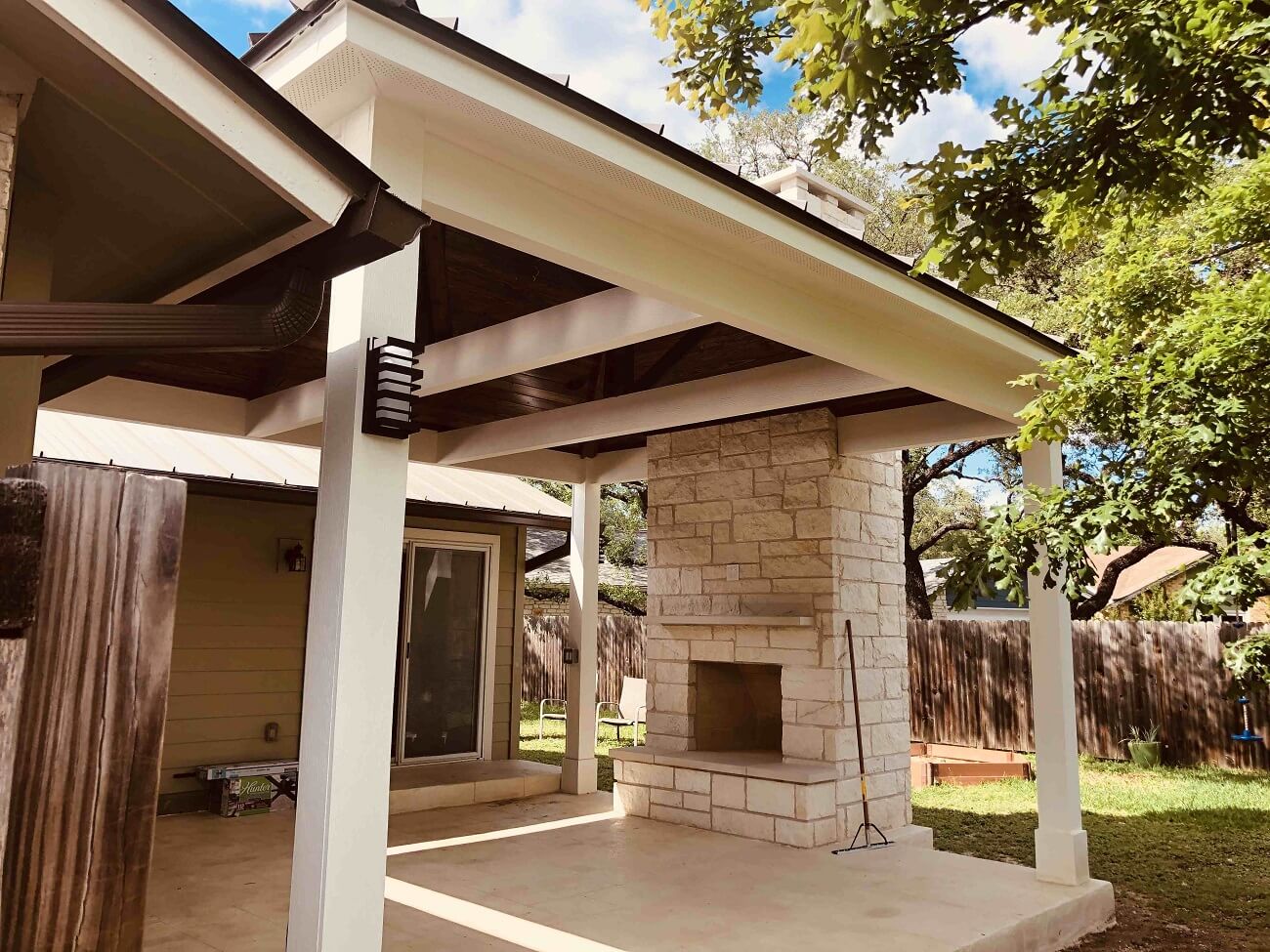 cabana with outdoor fireplace