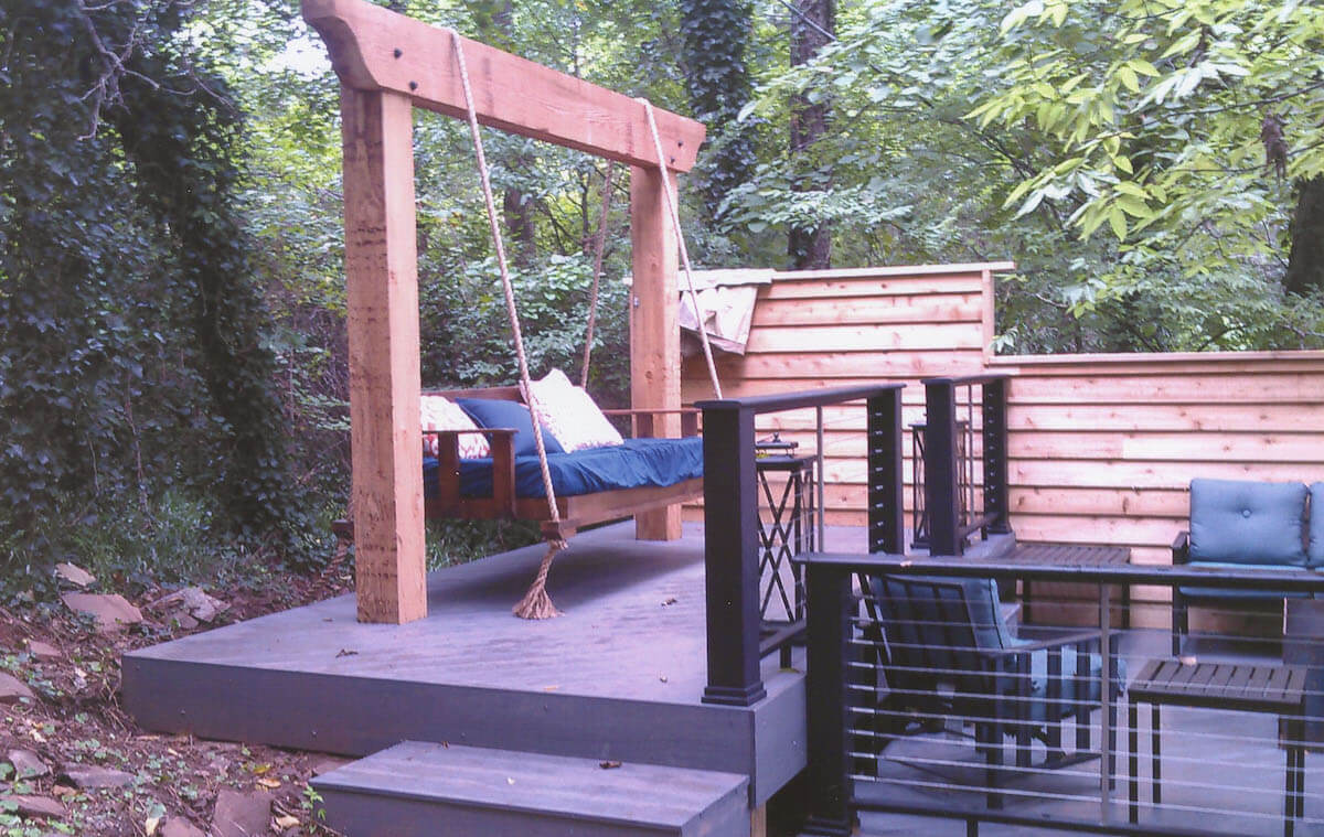 Deck and pergola with a swing