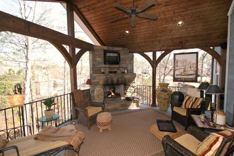 Custom open porch and deck with outdoor fireplace