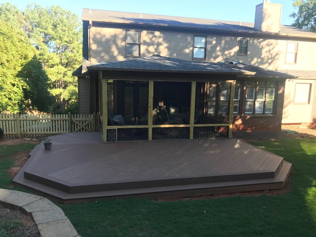 Custom backyard screened porch and wood deck