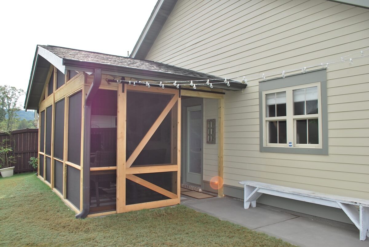 Barn door on screened porch