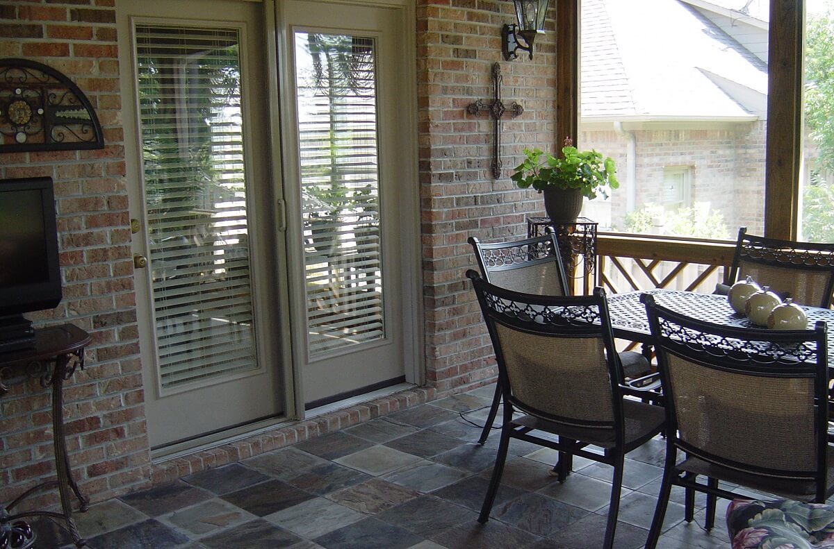 Custom screened porch with dining area