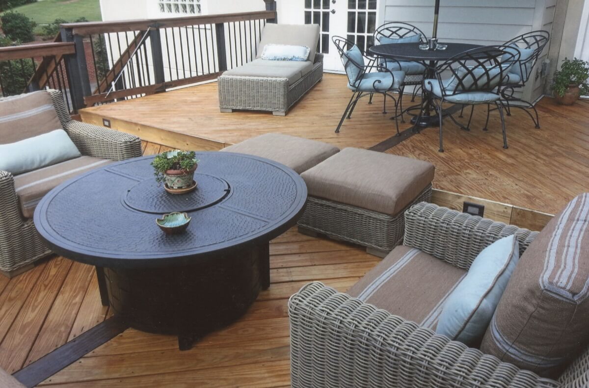 Wood deck with balusters, gate and lounge area