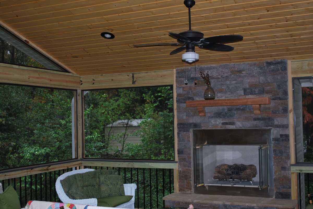 Screened porch with outdoor fireplace