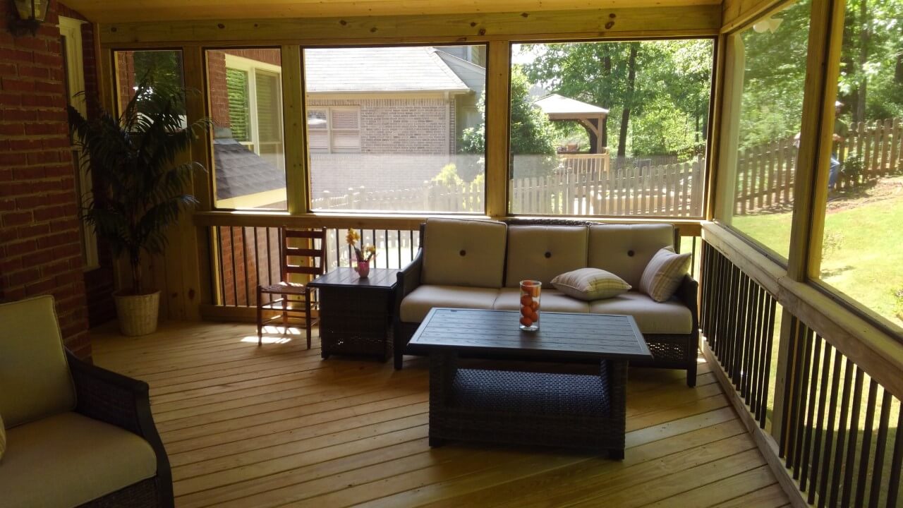 Cozy seating area on screened porch
