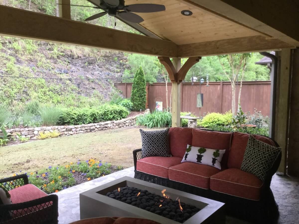 Custom covered porch with custom fire pit